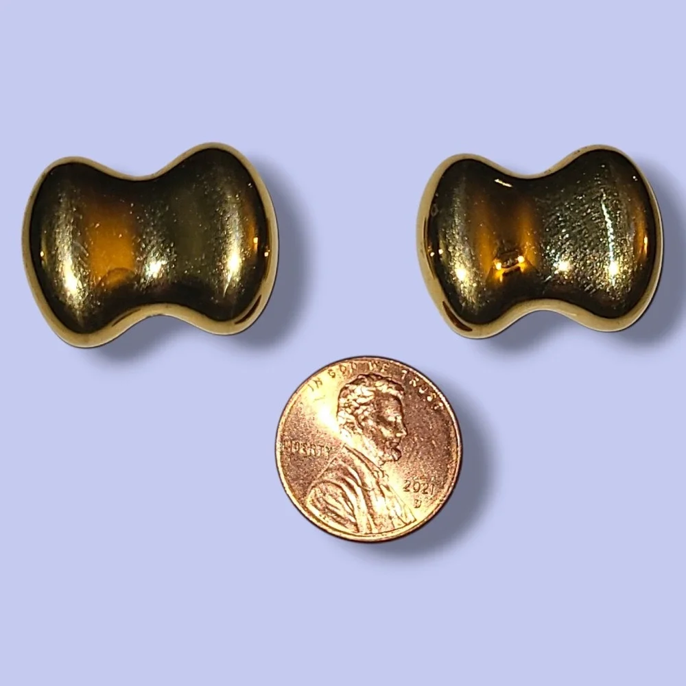 Vintage Monet Polished Gold Tone Bow Shaped 1" Wide Pierced Earrings - Picture 3 of 3